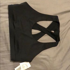 Medium black JustFab sports bra with cross back